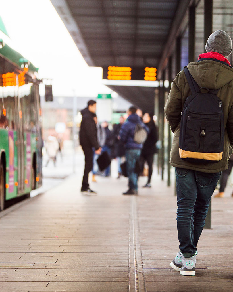 Man-waiting-at-bus-stop